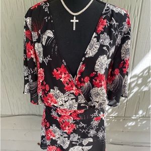 Elegant double breasted blouse at ties in the back